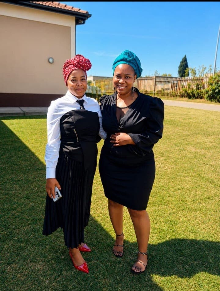 Two MMF outreach team members outside a community venue